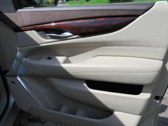 Photo of 2015 Silver Coast Metallic Cadillac Escalade