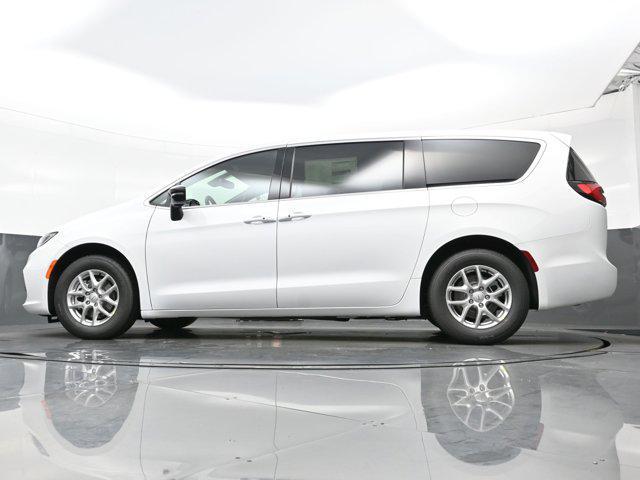 Photo of 2025 Bright White Clearcoat Chrysler Pacifica