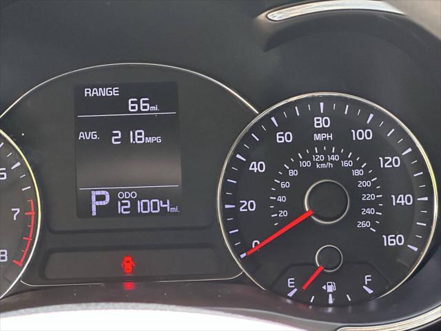 Photo of 2016 White Kia Forte