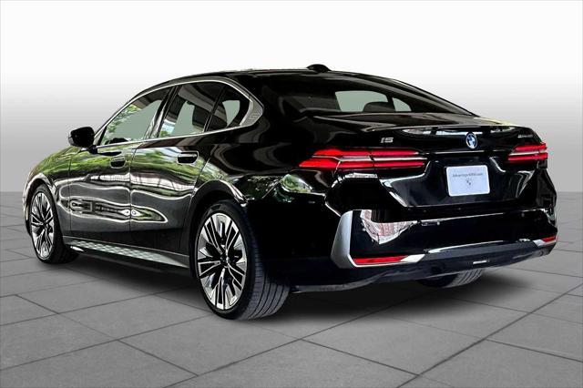 Photo of 2024 Black Sapphire Metallic BMW i5