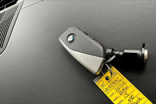 Photo of 2024 Black Sapphire Metallic BMW i5