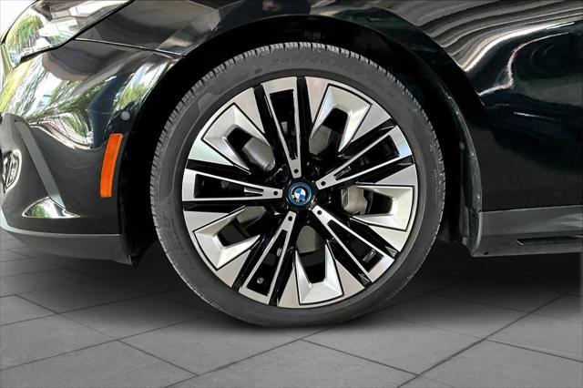 Photo of 2024 Black Sapphire Metallic BMW i5