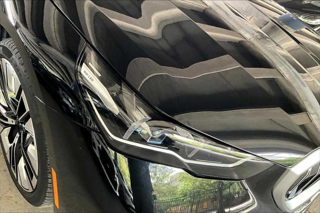Photo of 2024 Black Sapphire Metallic BMW i5