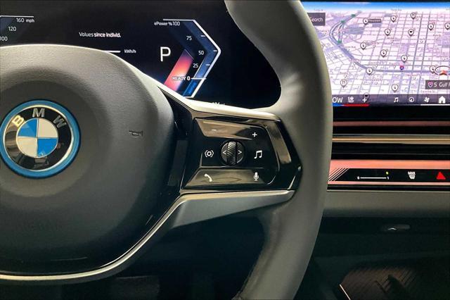 Photo of 2024 Black Sapphire Metallic BMW i5