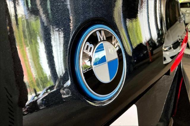 Photo of 2024 Black Sapphire Metallic BMW i5