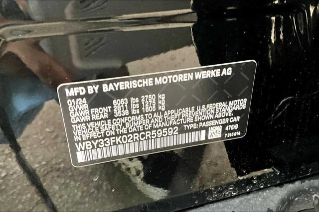 Photo of 2024 Black Sapphire Metallic BMW i5