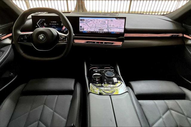 Photo of 2024 Black Sapphire Metallic BMW i5