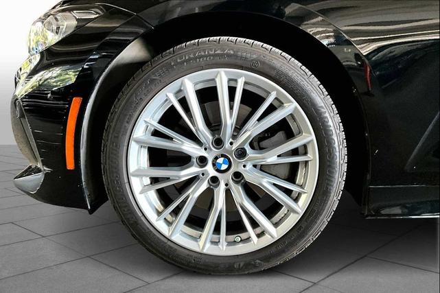 Photo of 2023 Jet Black BMW 330