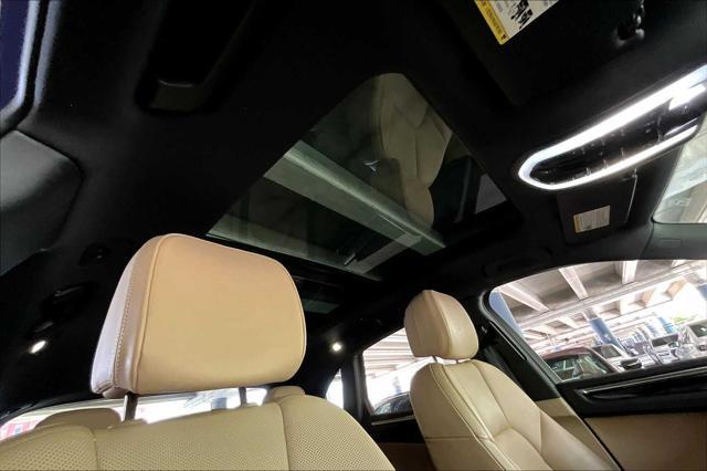 Photo of 2024 Gentian Blue Metallic Porsche Macan