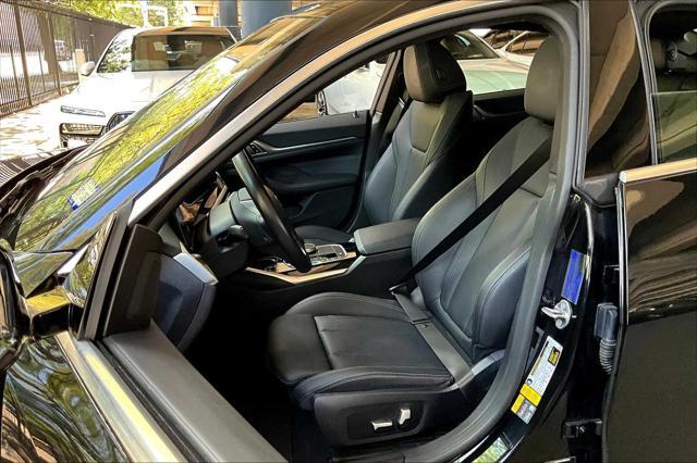 Photo of 2022 Black Sapphire Metallic BMW i4 Gran Coupe