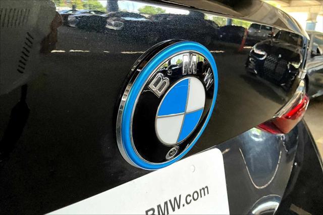 Photo of 2022 Black Sapphire Metallic BMW i4 Gran Coupe