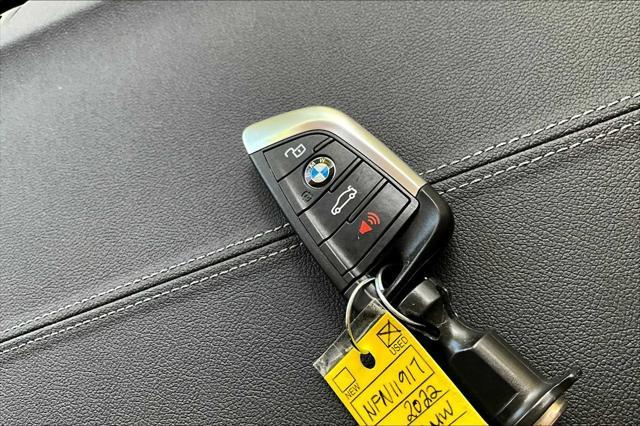 Photo of 2022 Black Sapphire Metallic BMW i4 Gran Coupe