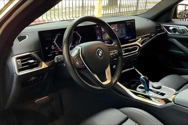 Photo of 2022 Black Sapphire Metallic BMW i4 Gran Coupe