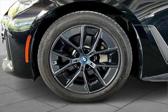 Photo of 2022 Black Sapphire Metallic BMW i4 Gran Coupe