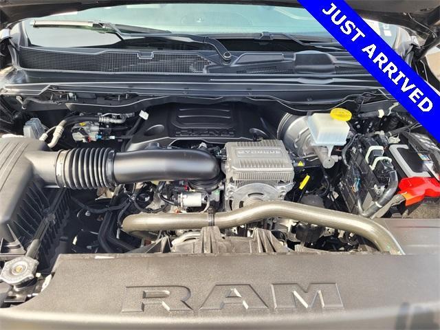 Photo of 2024 Granite Crystal Clearcoat Metallic RAM 1500
