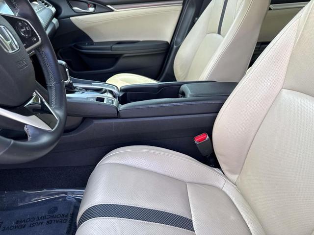 Photo of 2019 Platinum White Pearl Honda Civic