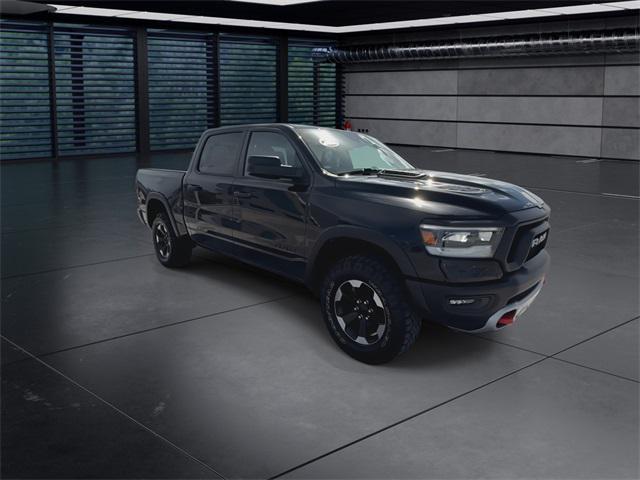 Photo of 2024 Diamond Black Crystal Pearlcoat RAM 1500