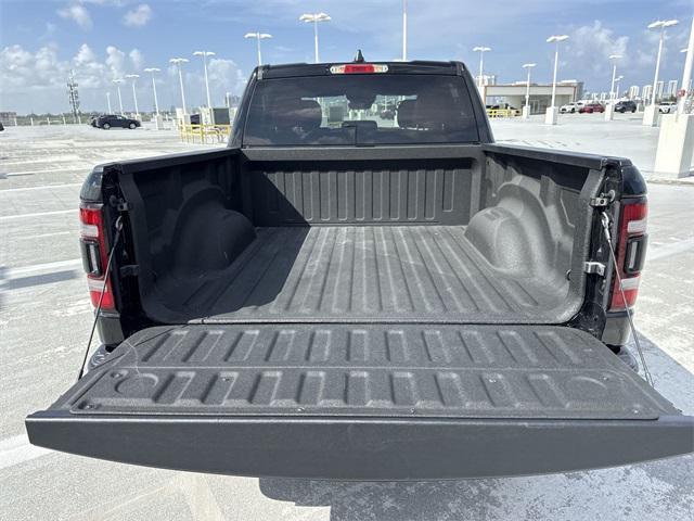 Photo of 2024 Diamond Black Crystal Pearlcoat RAM 1500