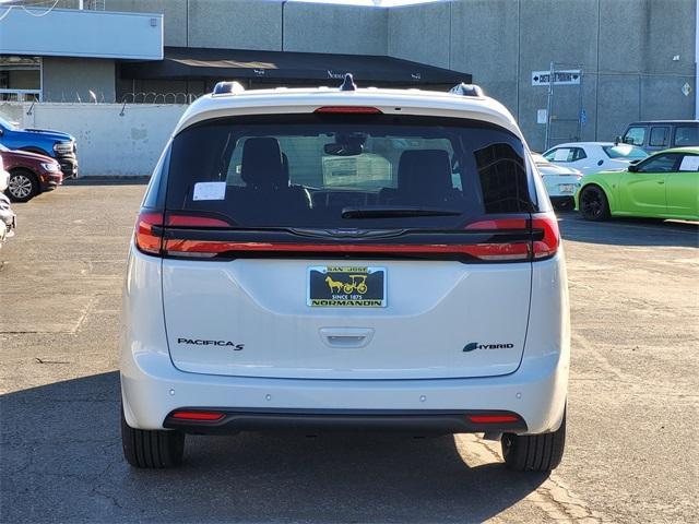 Photo of 2025 Bright White Clearcoat Chrysler Pacifica Hybrid