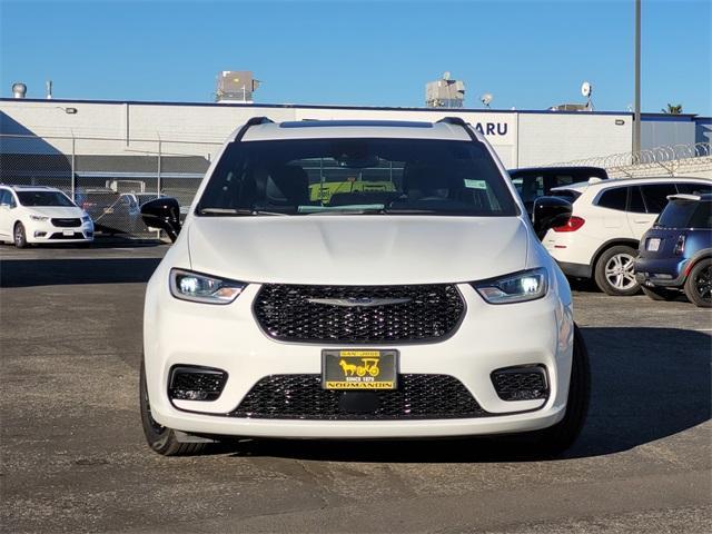 Photo of 2025 Bright White Clearcoat Chrysler Pacifica Hybrid