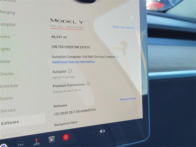 Photo of 2022 Pearl White Tesla Model Y