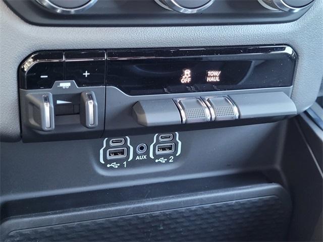 Photo of 2024 Hydro Blue Pearlcoat RAM 1500