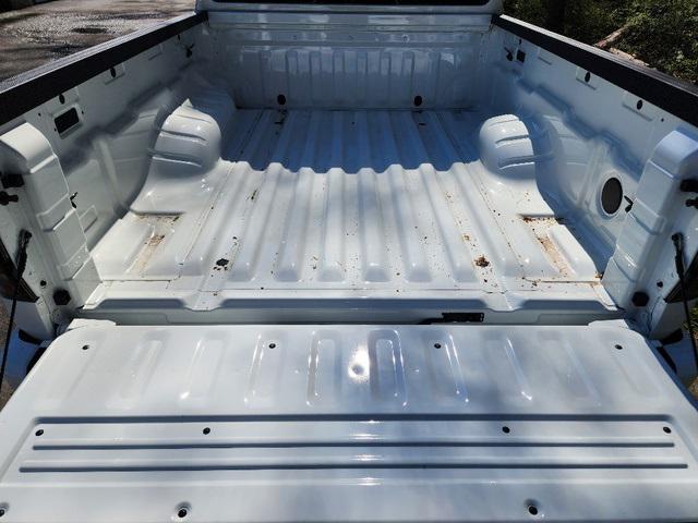 Photo of 2025 Glacier White Nissan Frontier