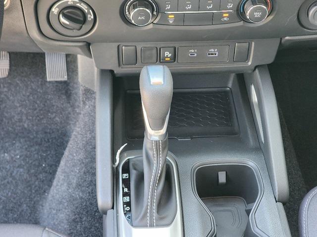 Photo of 2025 Glacier White Nissan Frontier