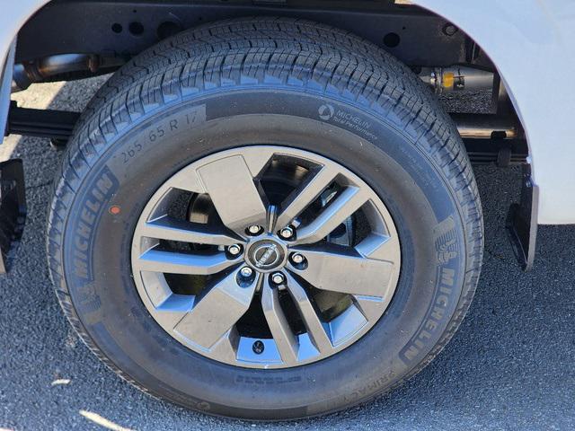 Photo of 2025 Glacier White Nissan Frontier