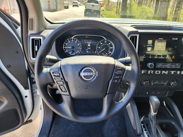 Photo of 2025 Glacier White Nissan Frontier