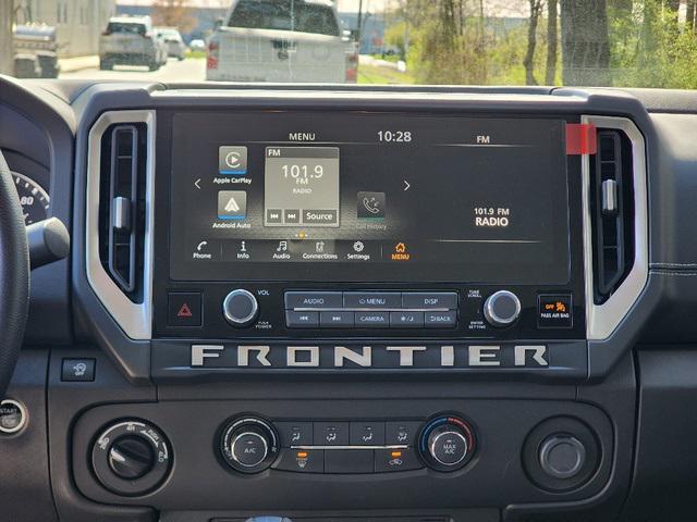 Photo of 2025 Glacier White Nissan Frontier