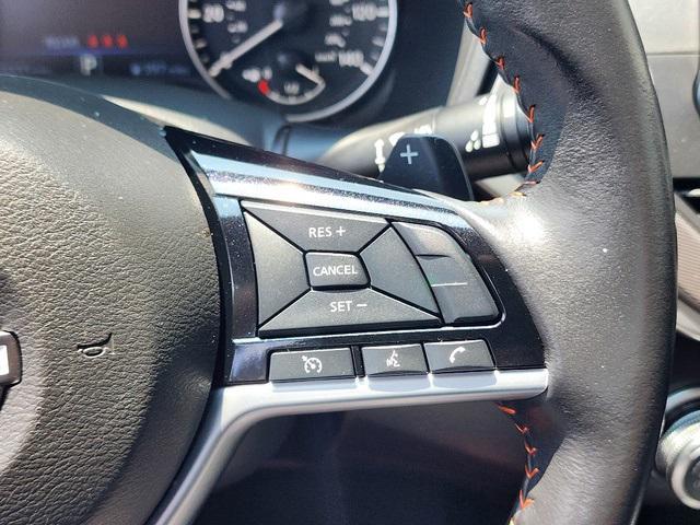 Photo of 2024 Super Black Clearcoat Nissan Altima