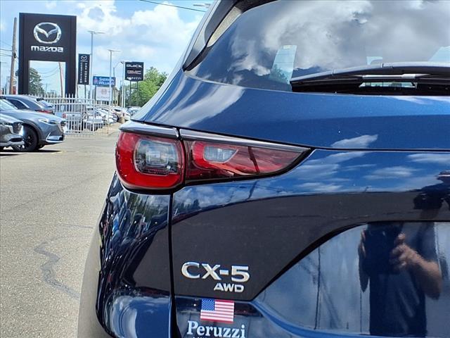 Photo of 2023 Deep Crystal Blue Mica Mazda CX-5