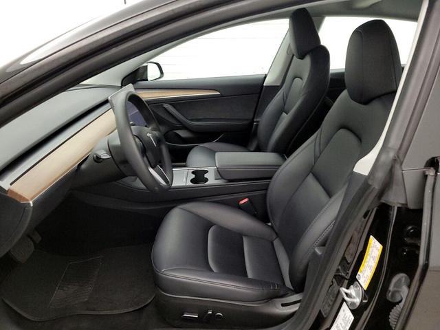 Photo of 2023 Black Tesla Model 3