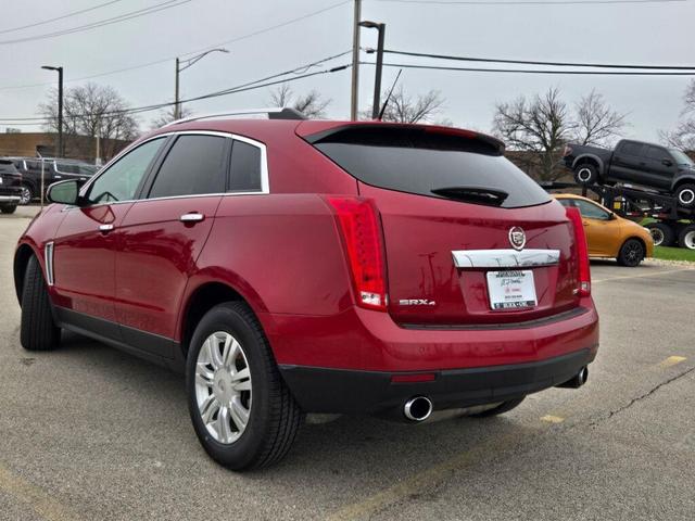 Photo of 2014 Crystal Red Tintcoat Cadillac SRX