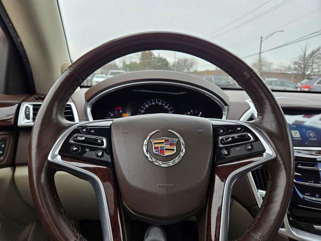 Photo of 2014 Crystal Red Tintcoat Cadillac SRX