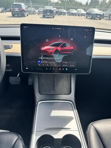 Photo of 2023 Red Multi-Coat Tesla Model 3