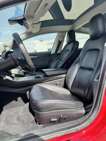 Photo of 2023 Red Multi-Coat Tesla Model 3