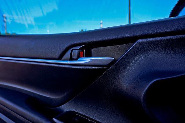 Photo of 2024 Midnight Black Metallic Toyota Camry