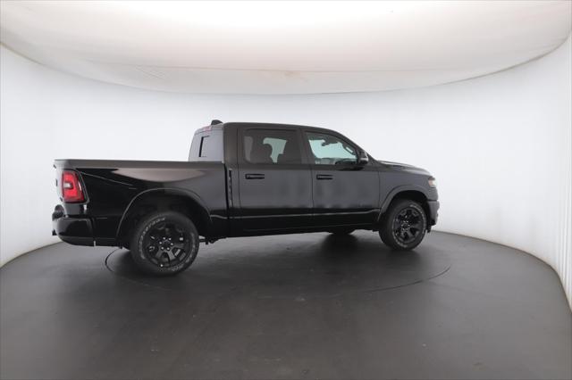 Photo of 2025 Diamond Black Crystal Pearlcoat RAM 1500