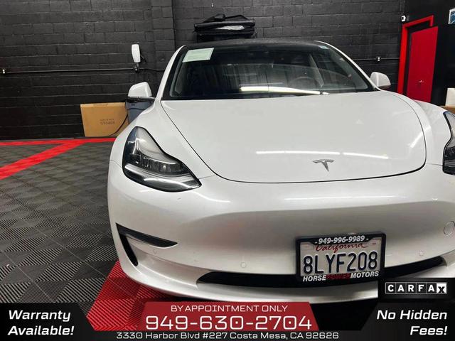 Photo of 2019 Pearl White Multi-Coat Tesla Model 3
