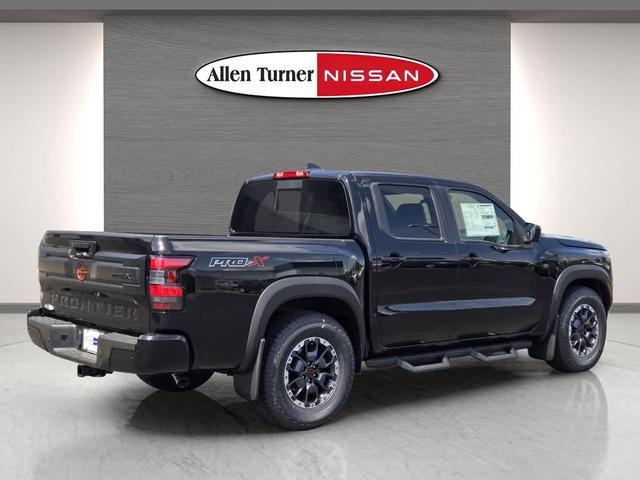 Photo of 2025 Super Black Nissan Frontier