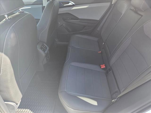Photo of 2024 Pure White w/Deep Black Roof Volkswagen Taos