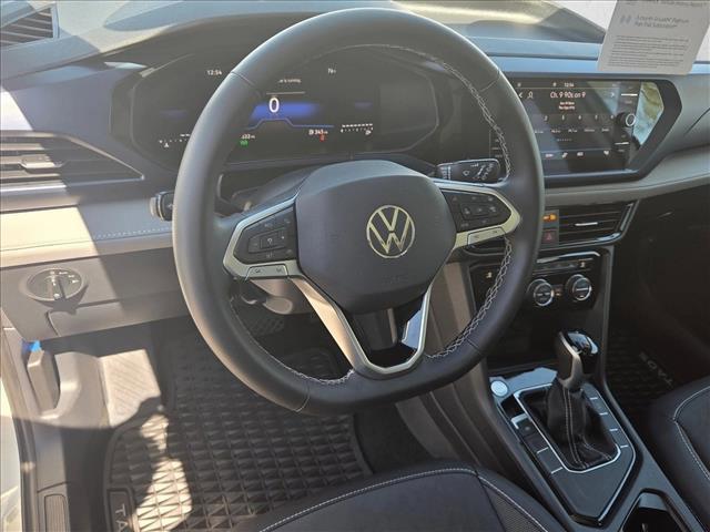 Photo of 2024 Pure White w/Deep Black Roof Volkswagen Taos