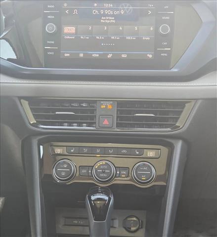 Photo of 2024 Pure White w/Deep Black Roof Volkswagen Taos
