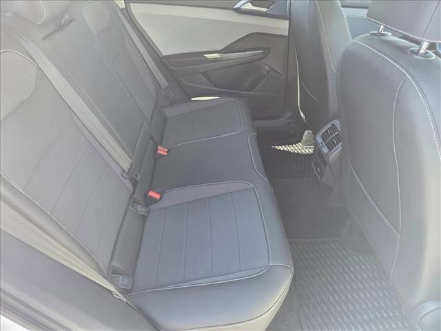 Photo of 2024 Pure White w/Deep Black Roof Volkswagen Taos