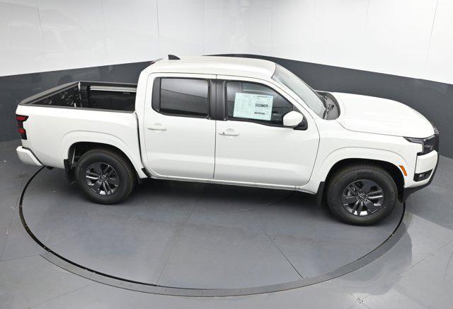 Photo of 2025 Glacier White Nissan Frontier