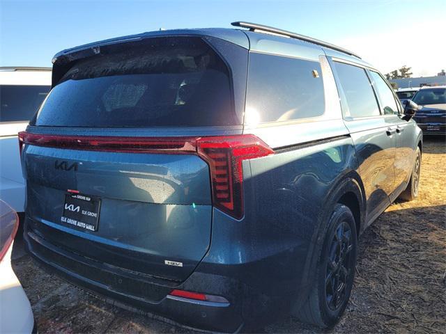 Photo of 2025 Astra Blue Kia Carnival Hybrid