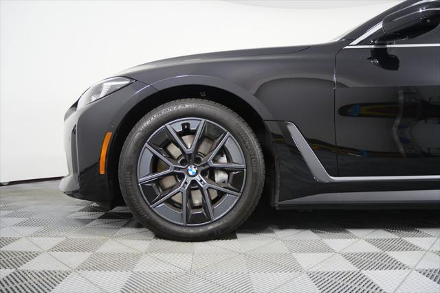 Photo of 2025 Black Sapphire Metallic BMW i4 Gran Coupe