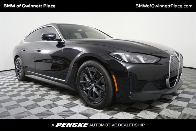 Photo of 2025 Black Sapphire Metallic BMW i4 Gran Coupe